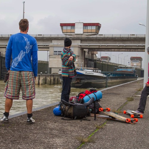 three friends longboarding the Danube cycling path