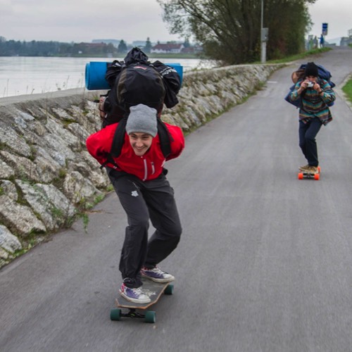 three friends longboarding the Danube cycling path