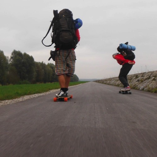 three friends longboarding the Danube cycling path