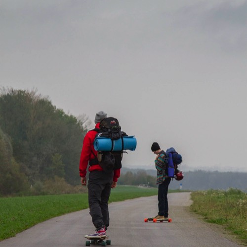 three friends longboarding the Danube cycling path