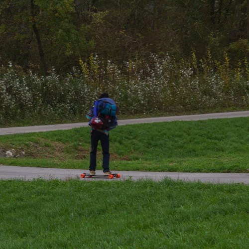 three friends longboarding the Danube cycling path