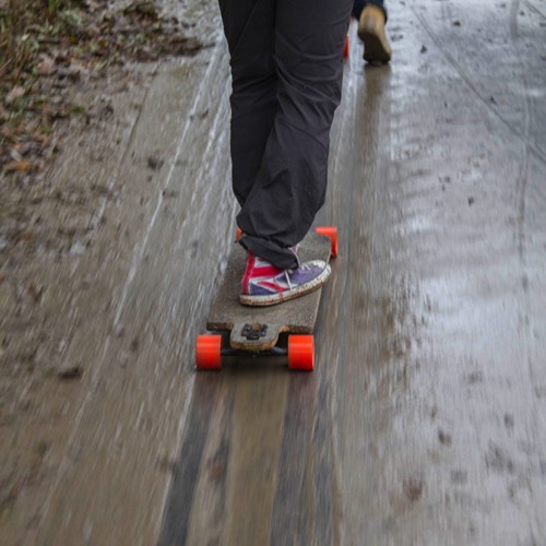 three friends longboarding the Danube cycling path