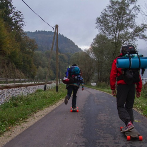 three friends longboarding the Danube cycling path