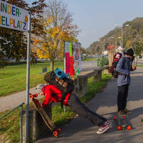 three friends longboarding the Danube cycling path