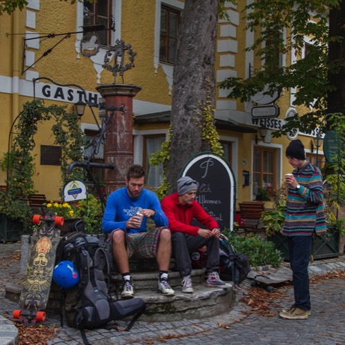three friends longboarding the Danube cycling path