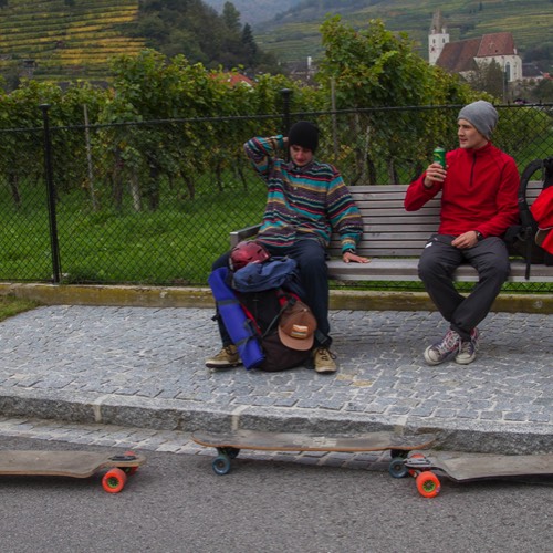three friends longboarding the Danube cycling path